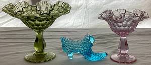 lot 10 image: Vintage Fenton Collection - Colonial Pink Thumbprint Footed Compote 6 Wide , Green Thumbprint Ruffled Compote 8 Wide and Hobnail Blue Cat Head Shoe