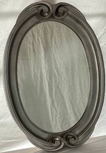 lot 20 image: Silver Grey Oval Thick Framed Mirror 30 x 22