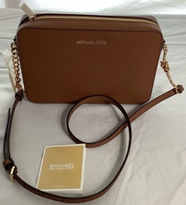 lot 6 image: Michael Kors Jet Set Item Large East West Zip Leather Tan Crossbody - New