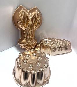 lot 19 image: 3 Vintage Copper Jello Molds