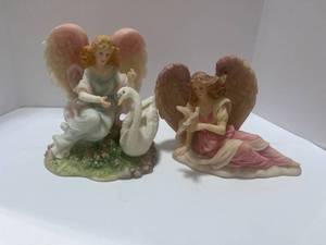 lot 55 image: Two 1990s Resin Angels