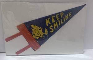 lot 79 image: Clown Pennant 4 X 9  Keep Smiling