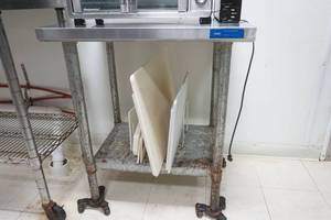 lot 10 image: Stainless Steel Countertop Cart with Galvanized Shelf on Casters