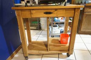 lot 36 image: Wooden Kitchen Island on Wheels