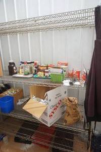 lot 38 image: NSF Wire Rack and Contents 24x48x75 (food past good by date)