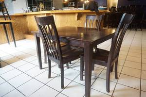 lot 76 image: Dining Room Table and 4 Chairs Deep Chocolate Color