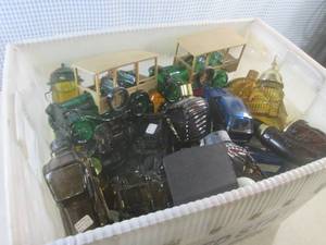 lot 64 image: (EC1) Box Full of Assorted Avon Bot...