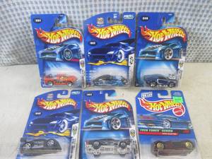 lot 147 image: (EC1) Assorted Hot Wheels in Packag...