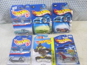 lot 148 image: (EC1) Assorted Hot Wheels in Packag...