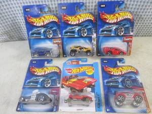 lot 150 image: (EC1) Assorted Hot Wheels in Packag...