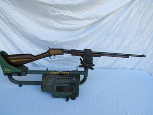 lot 12 image: Rossi 22 Pump Takedown Rifle