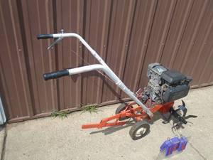 Vintage front tine tiller with Honda 5 hp motor. Tested & works. As shown.