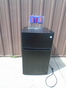 lot 109 image: Mini Kenmore fridge & freezer. Used one weekend. As shown.