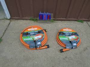 lot 112 image: New Woken 75 total feet garden hose. As shown.