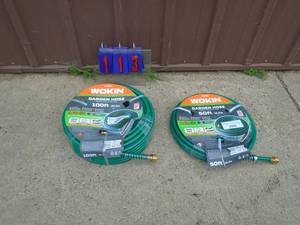 lot 113 image: New Woken 150 total feet garden hose. As shown.