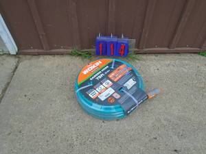 lot 114 image: New Woken 75 total feet garden hose. As shown.