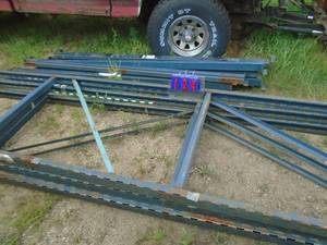 lot 124 image: Pallet racking. 3 uprights 14 x 38. 12 cross members 90 long. Well used but still sturdy. As shown.