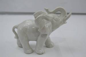 lot 10 image: Glossy White Ceramic Elephant Figurine - 6 Inch Accent Piece