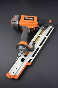 lot 53 image: RIDGID Framing Nailer, HDX 50-Piece Screwdriver Set, Nails, and Bag