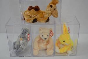 lot 98 image: Ty Beanie Babies Collection - Camel, Monkey, Bear, Bunny in Cases