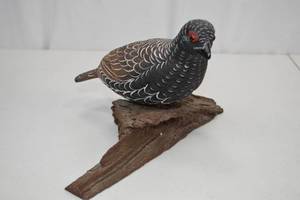 lot 111 image: Hand-Painted Carved Bird on Rustic Wood Base, 11x7 in.