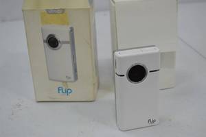 lot 148 image: Vintage Flip Video UltraHD Camcorder with Box