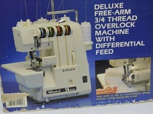 lot 151 image: Singer 14U234 Overlock Sewing Machine Deluxe Free-Arm Serger in Box