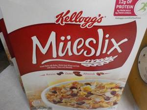 lot 263 image: 4 boxes Kelloggs Mueslix Cereal...