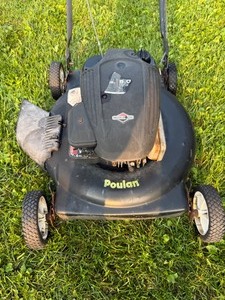 lot 12 image: Poulan lawn mower