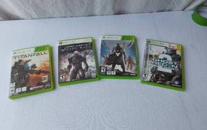 lot 29 image: Xbox 360 Video Games Set including Titanfall, Enemy Territory Quake Wars, Destiny, and Tom Clancys Ghost Recon Advanced Warfighter