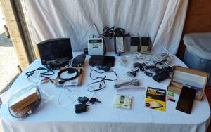 lot 49 image: Assorted Electronics and Accessories including Viasat Power Adapter, Midland Weather Radio, Juliette Walkie Talkies and Various Cables