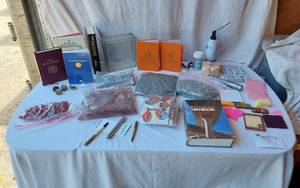 lot 60 image: Lutheran Handbook and FetchFind Notebooks, Decorative Glass Blocks, and Craft Supplies