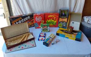 lot 68 image: Jesse Ventura Doll and Board Games including Showdown Yahtzee, Scrabble, and Apples to Apples