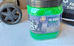 lot 84A image: Colt 10,000 Count 0.12g 6mm Clear Green Airsoft BBs