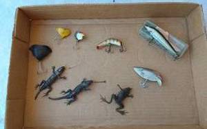 lot 100 image: Vintage fishing lures including Kautzky Lazy Ike, Rapala Minnow, and others