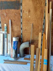 lot 136 image: Mixed Lot of Home Improvement Supplies Including Door Sweep and Drawer Slides, Semi-Rigid Aluminum Duct, and Various Wood Pieces