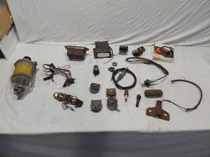 lot 196 image: Automotive Parts including S.I.G.M.A Fuel Filter, Gaskets, and Wiring