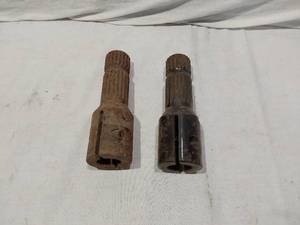 lot 197 image: Pair of PTO Adapters - One is slightly bent