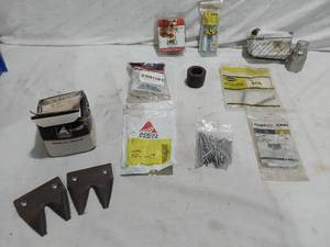 lot 282 image: Mixed Brand Lot of Farm Equipment Parts including clevis pins, cotter pins, a quick coupler, and more