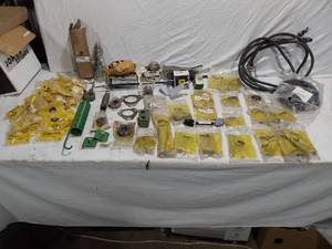 lot 297 image: John Deere Parts and Electronics Assortment including Wiring Harnesses, Control Modules, and Various Components - As Pictured