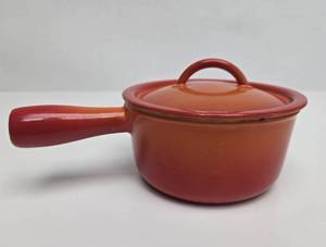 lot 108 image: Mid Century Cast Iron & Orange Enamel Sauce Pot wLid - Belgium