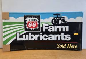 lot 236 image: Genuine NOS Unused Large PHILLIPS 66 Farm Lubricants Embossed Metal Sign