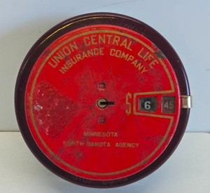 lot 344 image: Very Cool Old Union Central Life Coin Bank