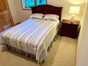 lot 27 image: Thomasville Impressions Queen Wooden Bed Frame and Nightstand
