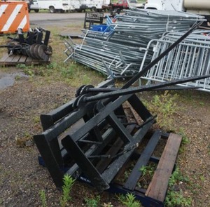 lot 27 image: Brand New Universal Mount Bobcat Skid Loader Skid Steer Bale Handling Attachment