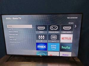 lot 65 image: 50 onn. Roku TV, a smart TV that integrates the Roku streaming platform.