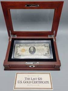 lot 10 image: 1928 $20 Gold Certificate in Display Case