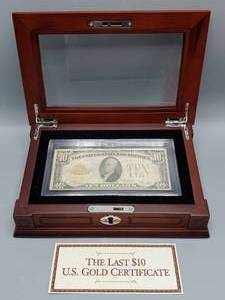 lot 11 image: 1928 $10 Gold Certificate in Display Case