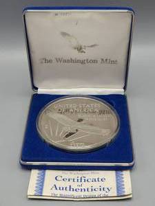lot 12 image: 1997 Platinum Eagle--4 ozt. .999 Silver & Plated in Platinum--3.5 Inches Dia.