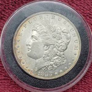 lot 26 image: 1883 Morgan Silver Dollar in Airtite, Higher Grade